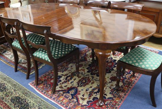 A 1930s mahogany extending dining table, plus two leaves	 W.152cm